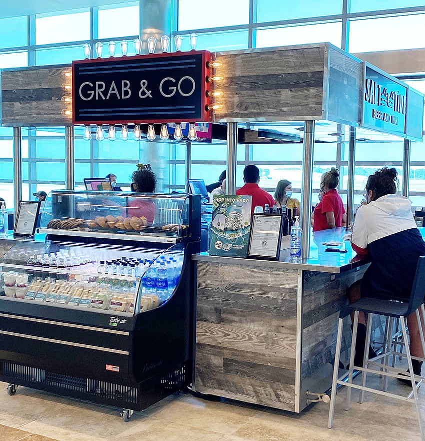 Salt & Tide operates as a beer and wine bar kiosk at Myrtle Beach International Airport.
