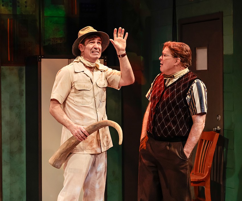 Gil Brady explains to Kraig Swartz that safaris and space missions have something in common in FST's 