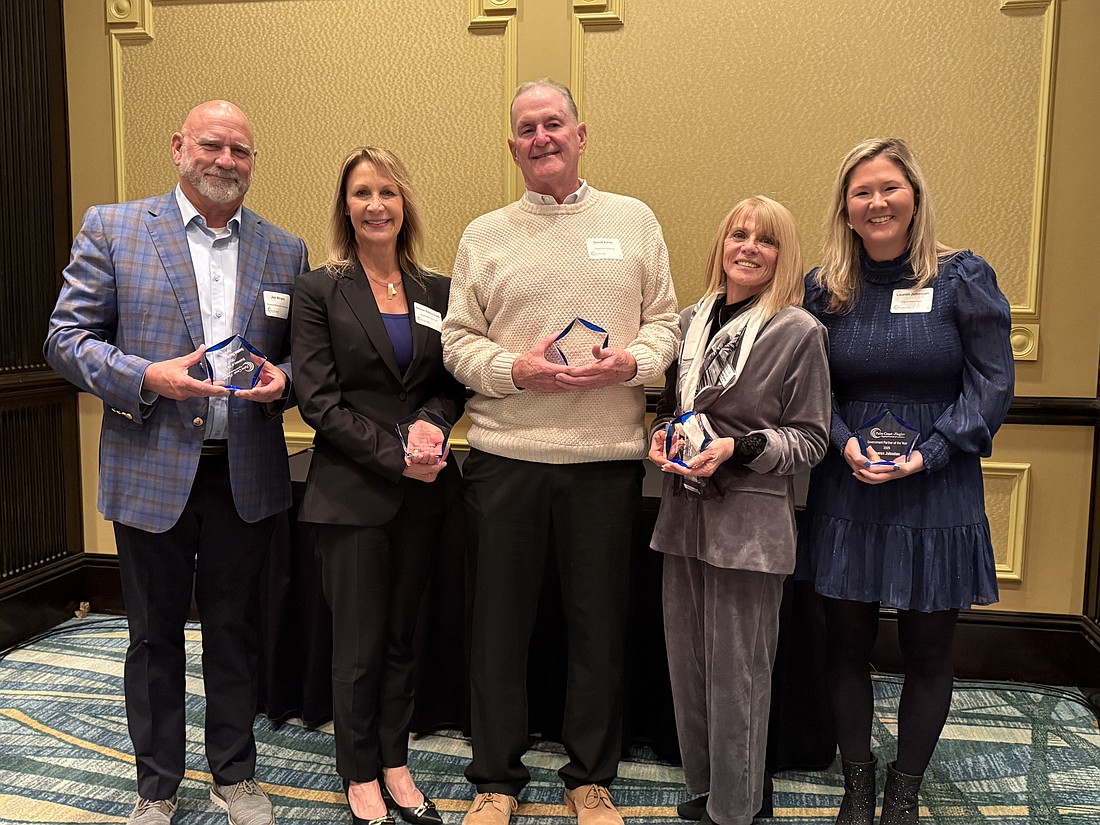 The Palm Coast-Flagler Regional Chamber of Commerce 2026 award winners: Joe Wright, Denyse Bales-Chubb, David Ayres, Donna McGevna and Lauren Johnston. Photo by Brian McMillan