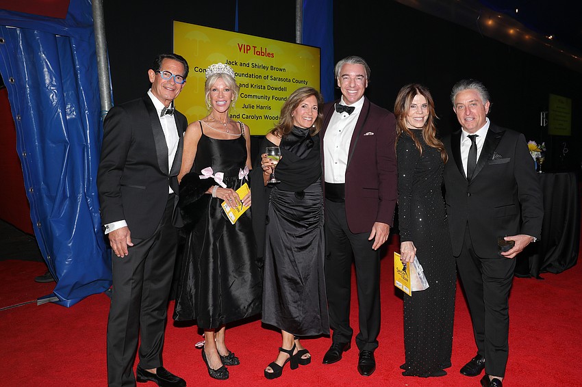 Jim Volpenhein, Dawn Spencer, Gini Martini, Chad Turnbull, Renee Phinney and Glen Rieth look forward to the evening's events at the CAC gala.