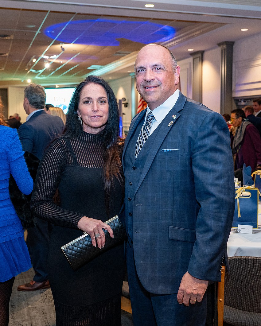 Kelly and Police Chief Rex Troche