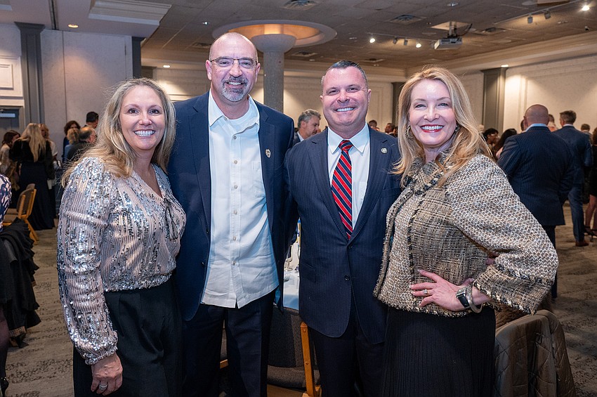 Heather Todd, Capt. John Todd, Pat Robinson and Emily Walsh