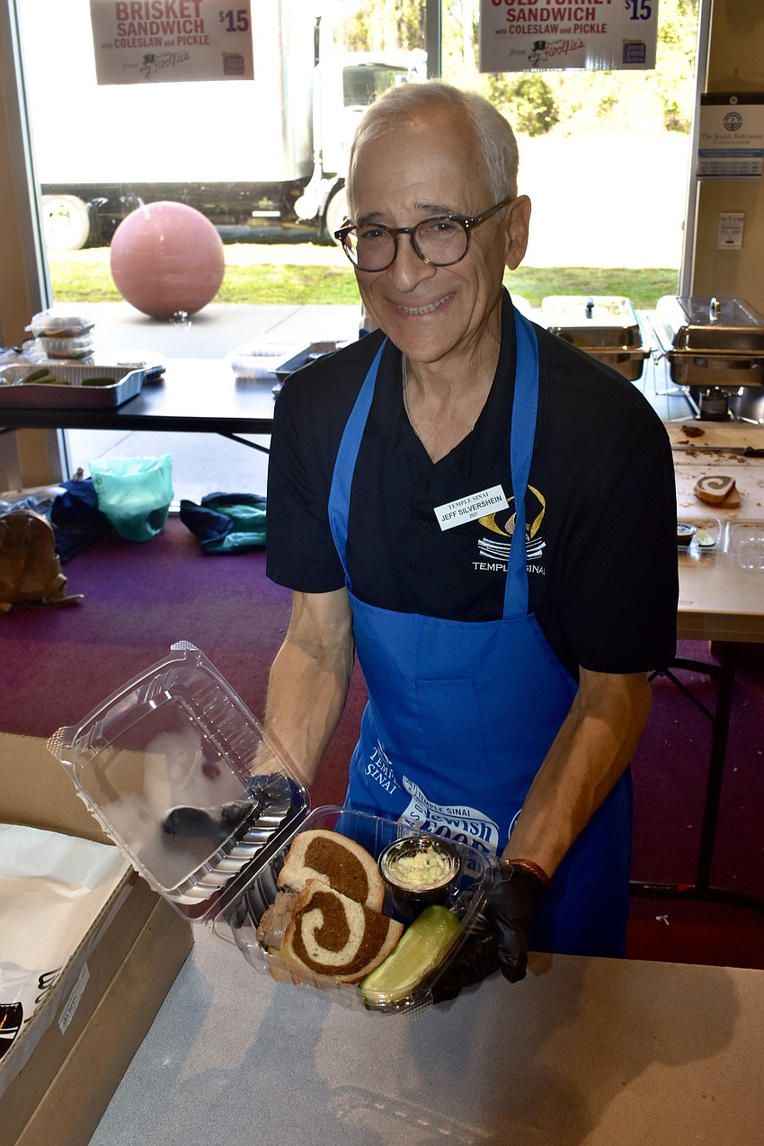 Jeff Silvershein helped to prepare sandwiches.