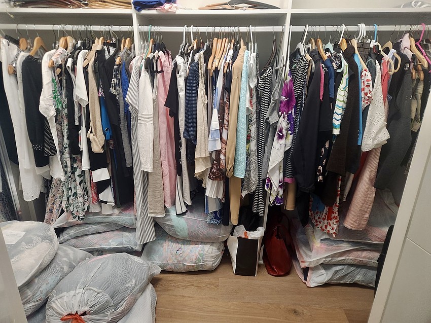 The Lake Club's Mary Myers stores off-season items at her home until The Exchange will accept them.