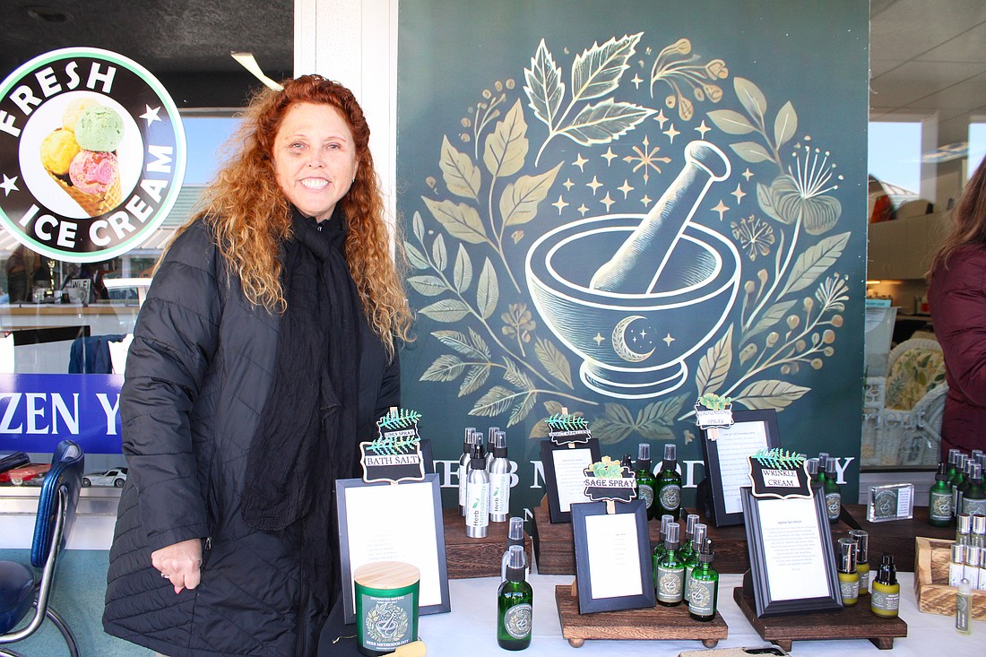 Herb Methodology co-owner Tryla Brown Larson celebrates the launch of her line of locally made products at Longboat Key's Design 2000 Salon on Jan. 29.