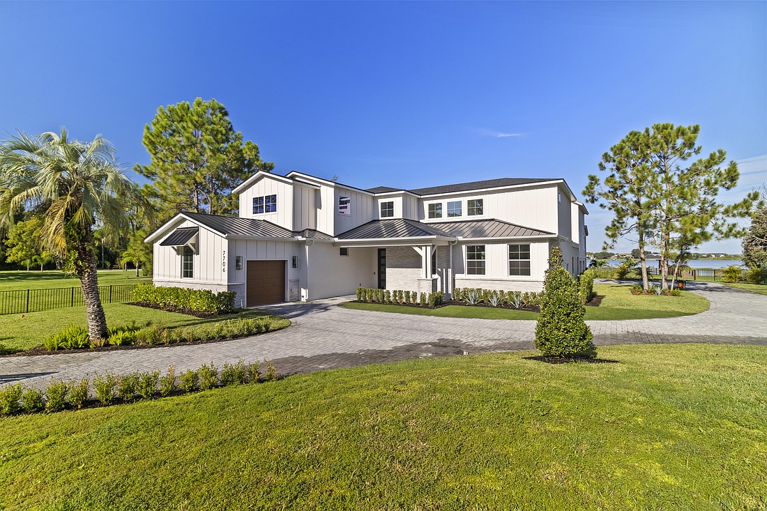 The home at 7706 Ficquette Road, Winter Garden, sold Jan. 28, for $3,600,000. This lakefront estate features a boat dock, private balconies and a guest suite. The sellers were represented by Ruthanne Martin, Revel Realty LLC.