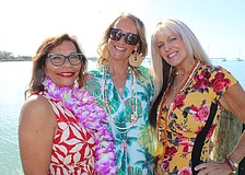 Sisterhood for Good members Nikki Pelier-Simon, Samina Morrow and Allison Adams show off some fashions that will be in the spotlight at Tropical Escape July 27 at the Sarasota Polo Club.