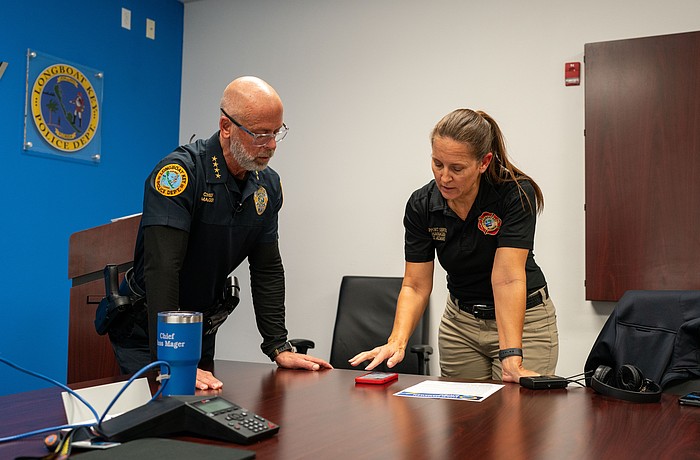 Longboat Key’s social media presence is thanks in large part to Tina Adams, whose duties include leading a communications team who regularly post infographics, flyers and breaking news alerts to its Facebook, Instagram and X pages. On a Thursday afternoon, Adams walked over to the police station to meet with Police Chief Russ Mager to film the latest video series shared by the town: A Minute with Mager. Adams helped get the right take with the chief, tweaking the script and discussing what was important to include and what could be left out.