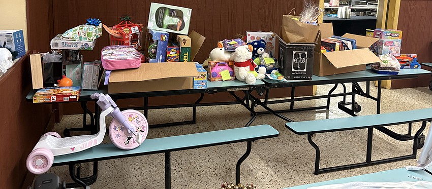 At St. Paul’s Basilica, toys were distributed on the final day of the Christmas Novena, with remaining gifts given during the Jan. 6 Three Kings Day celebration. Courtesy photo