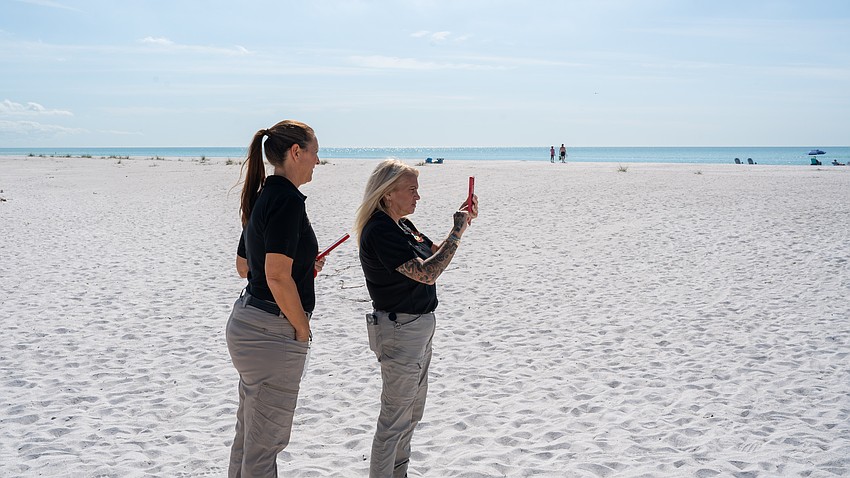 Tina Adams and Tara Peta took to the white powder beach to film an Instagram reel. Adams said communications duties are more than just sharing news, but sometimes just highlighting the beauty of the island Longboaters call home. Other times, Adams and the communications team uses newsworthy events, like the opening of Joan M. Durante Park after repairs were completed, to create content that engages the community. A fast-forward video of a trip along the Durante Park boardwalk and trail system got 178 likes on Instagram, causing the news to spread among community members quickly.