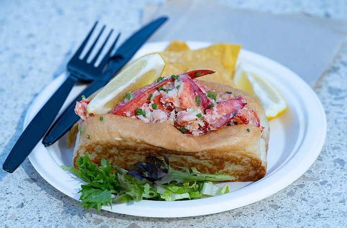 Lido Island Grill's lobster roll, filled with chilled Maine lobster and served with tortilla chips and lemon.