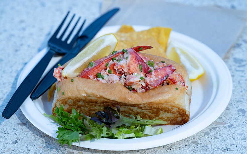 Lido Island Grill's lobster roll, filled with chilled Maine lobster and served with tortilla chips and lemon.