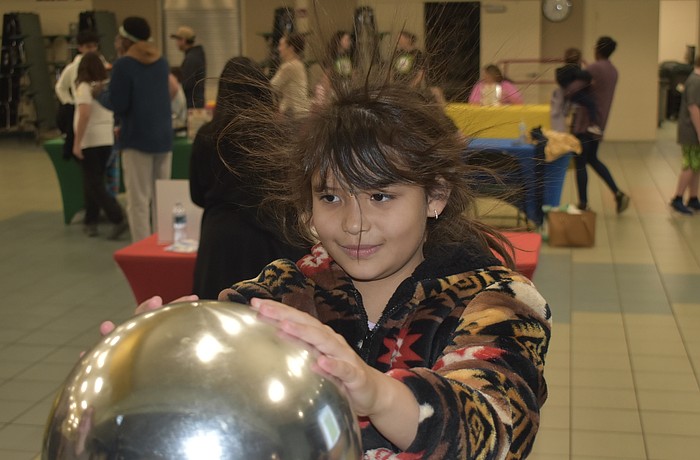 Second grader Sovereign Osceola experiences static electricity.