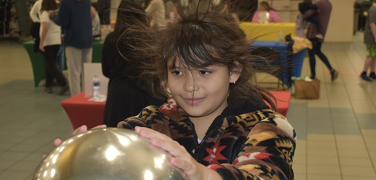 Second grader Sovereign Osceola experiences static electricity.