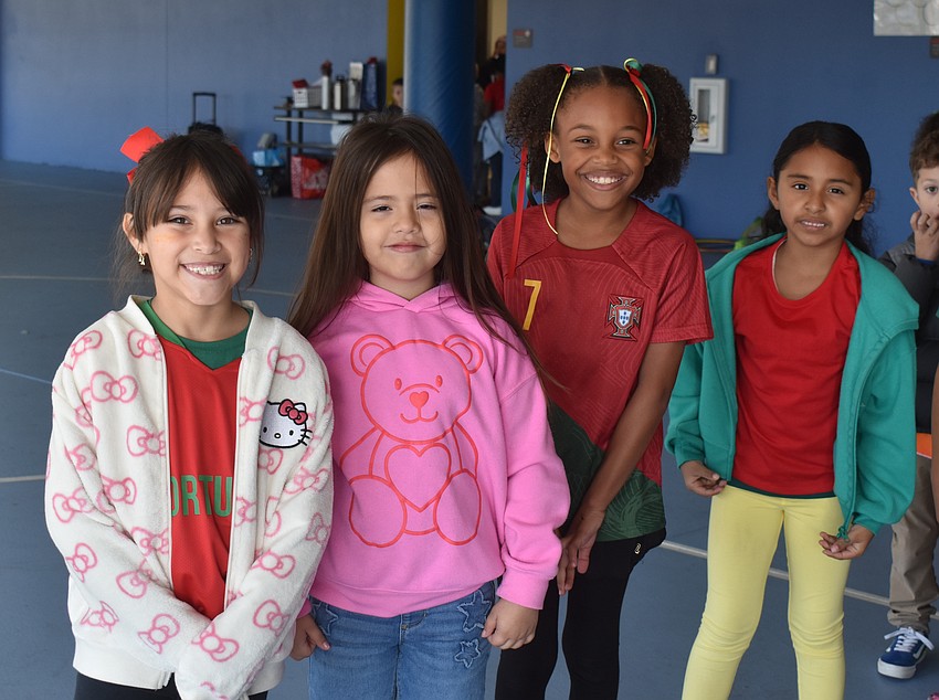 First graders Alyson Morales, Lillian Santiago Pastrana, Elliette Barfield and Jaymie Esquivel Pastrana prepare to switch stations at the Tara Olympics.
