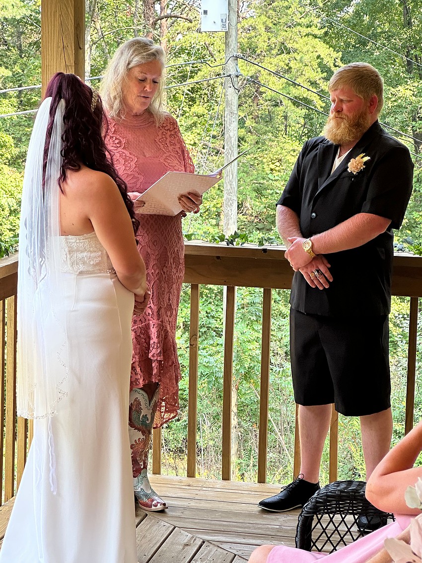 Patrice Fanning, who recently started her Longboat Key-based officiant business Forever without Borders, presides over a wedding.