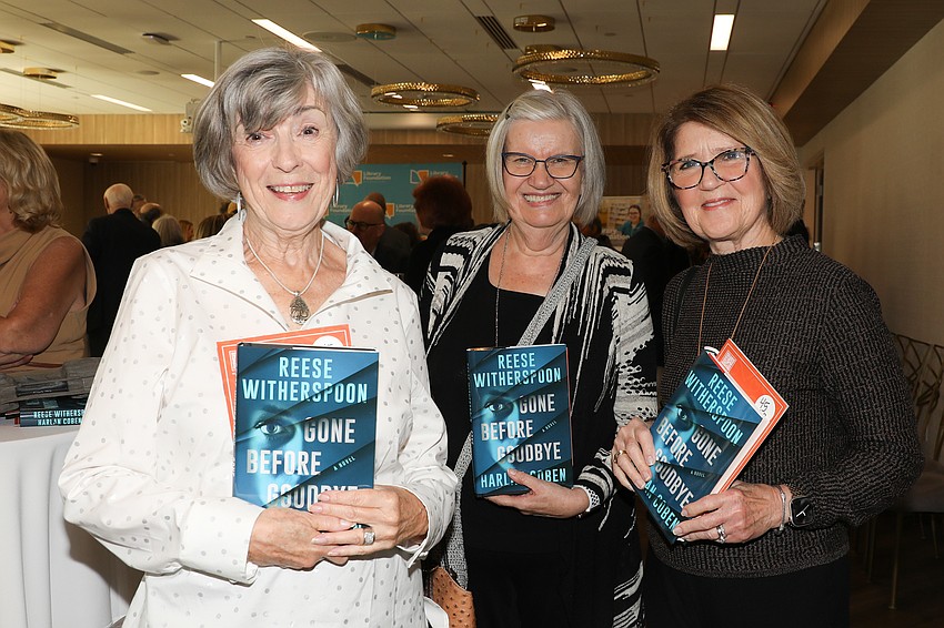 Betty Wolfe, Diane Kremkow and Valerie Resh with their copy of Harlen Coben's latest book.
