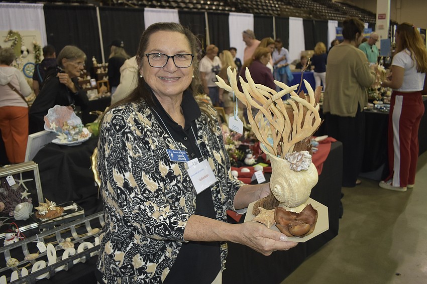 Dawn Deganis said she enjoys creating art pieces with natural materials including wood, bark, ferns, unusual shells and stones. 