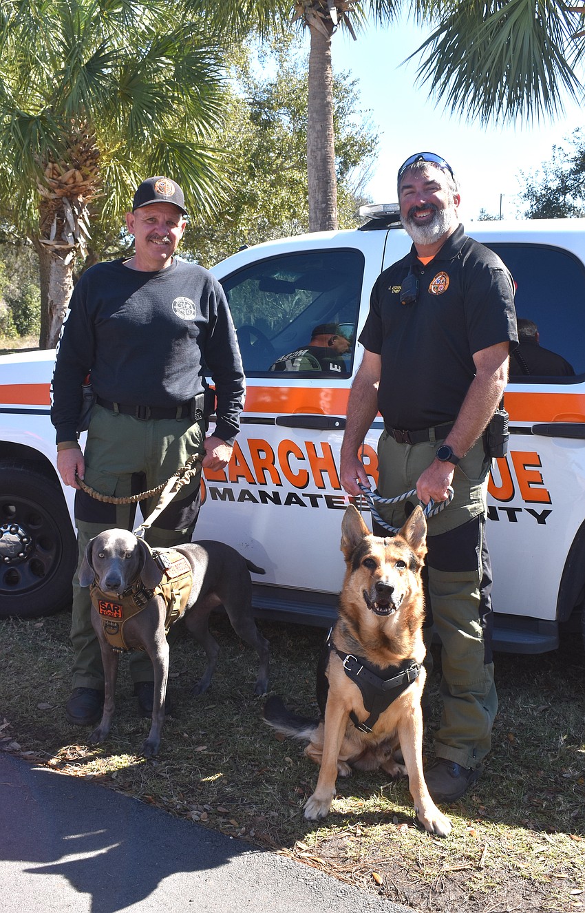 Manatee County Search and Rescue's Kevin Vreeland and Jared Leggett bring Bella Grace, a 3-year-old Weimaraner, and  Kaido, an 8-year-old German shepherd, to be part of the fun at the Celebrate Our First Responders event.