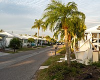 Spanish Main Yacht Club was one of the most impacted communities from Hurricanes Helene and Milton. All of the 212 condominium villas were impacted one way or another, and more than 16 months after Helene, the rebuild continues with some houses finished and residents moved in and others with cabinets in the front yard, work underway on the interior.