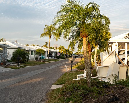 Spanish Main Yacht Club was one of the most impacted communities from Hurricanes Helene and Milton. All of the 212 condominium villas were impacted one way or another, and more than 16 months after Helene, the rebuild continues with some houses finished and residents moved in and others with cabinets in the front yard, work underway on the interior.