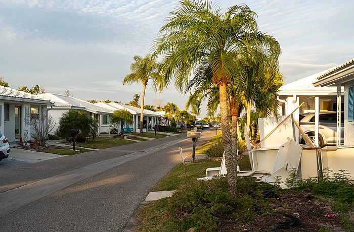 Spanish Main Yacht Club was one of the most impacted communities from Hurricanes Helene and Milton. All of the 212 condominium villas were impacted one way or another, and more than 16 months after Helene, the rebuild continues with some houses finished and residents moved in and others with cabinets in the front yard, work underway on the interior.
