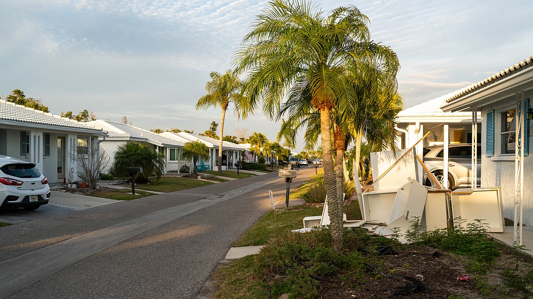 Spanish Main Yacht Club was one of the most impacted communities from Hurricanes Helene and Milton. All of the 212 condominium villas were impacted one way or another, and more than 16 months after Helene, the rebuild continues with some houses finished and residents moved in and others with cabinets in the front yard, work underway on the interior.