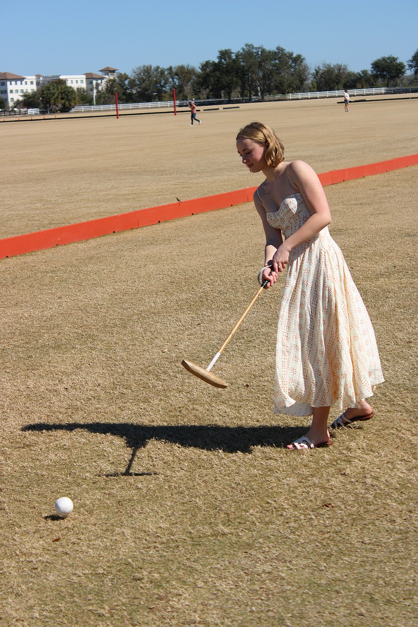 Waterside's Audrey Luke, 17, tries out her polo skills during Polo with the Pros Feb. 8. Luke was presented a $750 scholarship for her efforts in giving back to her community.