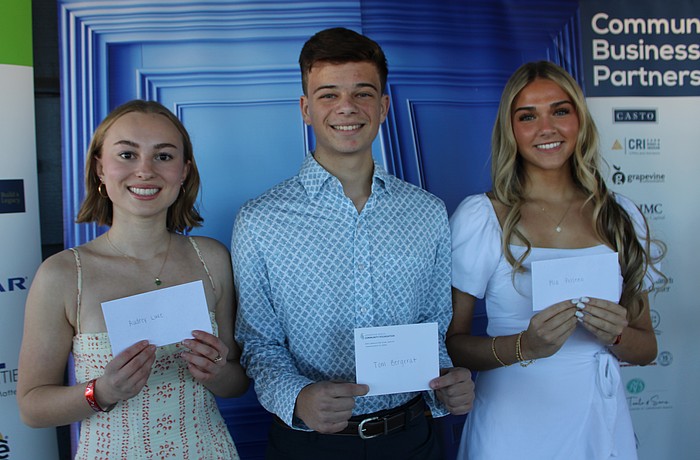 Tom Bergerat (center) was presented with a $3,500 scholarship at Polo with the Pros after being named the Junior Humanitarian of the year while Waterside's Audrey Luke (left), a junior at The Out-of-Door Academy, and Parrish's Mia Polseno (right), a senior at Parrish Community High, each received $750 scholarships.