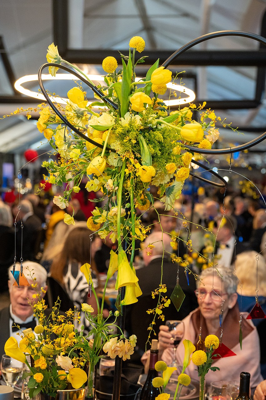 There were ll different kinds of flowers in the centerpieces.