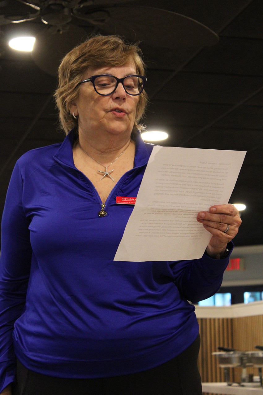 Cynthia Craig, former Children's Guardian Fund board president and wife of Longboat Key Mayor Ken Schneier, offers a few words at the Feb. 5 Kiwanis Club of Longboat Key check presentation to the Fund from the Lawn Party.