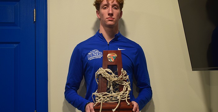 Noah Spenn, a three-sport athlete at Sarasota Christian, is busy playing football or volleyball when he's not hooping on the hardwood.