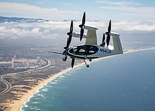 An eVTOL manufactured by Joby Aviation flies over Monterey Bay in California.