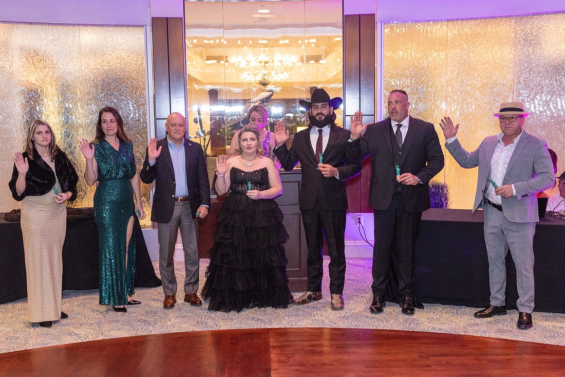 From left, Kaleigh Rickard, Smart Guard Shutters; Michelle James, Space Coast Credit Union; Don O’Brien, Hayward Brown; Teresa Schwarzkopf, Anchor Electric; Tali DeJesus, 1621 Building & Remodeling; Robbie Barrick, Integrity Homes; Frank Whalen, East Coast Building Coast. Courtesy photo