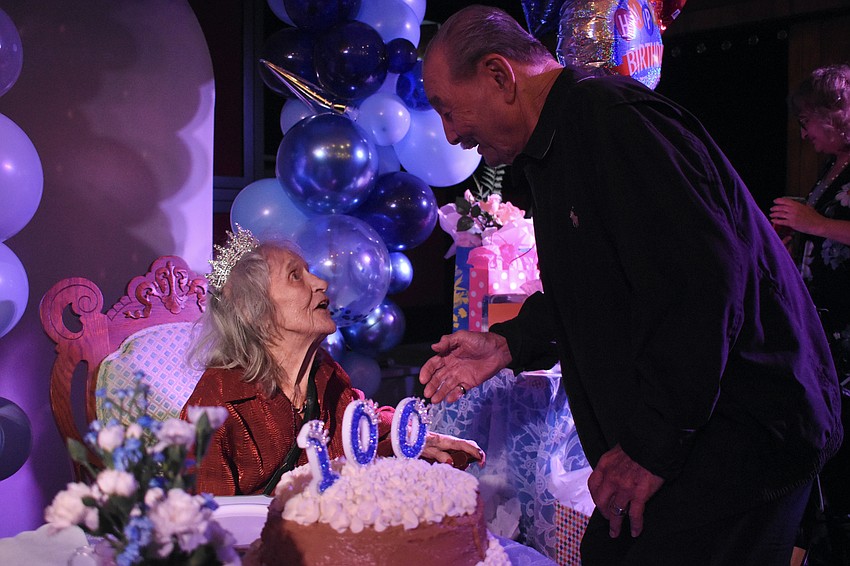 La Norma Fox greets Jonnny Yong.