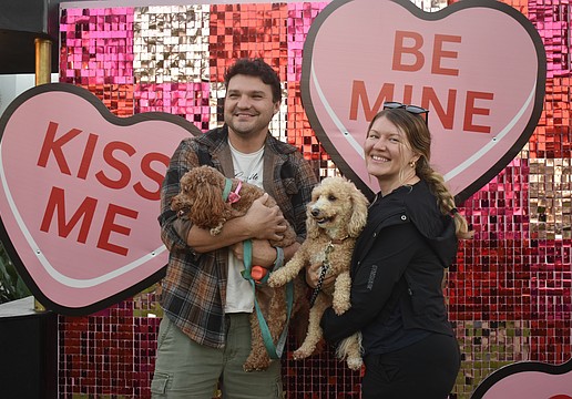 Lakewood Ranch's Eugene Khutoryanskiy and Yana Parker are celebrating this Valentine's Day as fiances alongside their dogs Mittens and Jesse at Barks & Brews on Feb. 10.