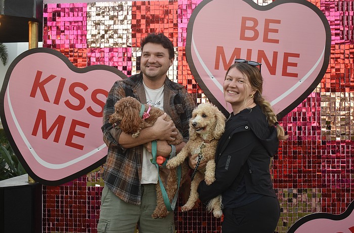 Lakewood Ranch's Eugene Khutoryanskiy and Yana Parker are celebrating this Valentine's Day as fiances alongside their dogs Mittens and Jesse at Barks & Brews on Feb. 10.