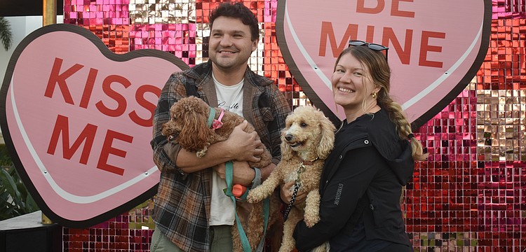 Lakewood Ranch's Eugene Khutoryanskiy and Yana Parker are celebrating this Valentine's Day as fiances alongside their dogs Mittens and Jesse at Barks & Brews on Feb. 10.