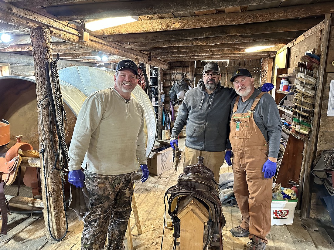Jeff Stellinga, Felix Gonzalez and Joel Johnson oiled more than 120 saddles and saddle bags at Wind River Ranch to support participants of Healing Warriors Week.