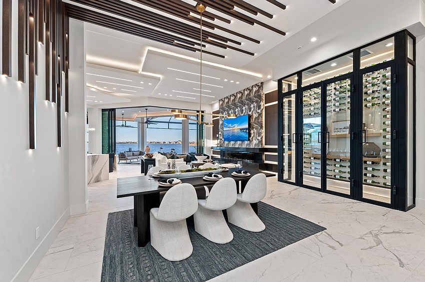 Lee Wetherington's model homes, such as the Sand Dollar, emphasize options and features, such as this wine cabinet, to induce visitors to spend more time in the model.