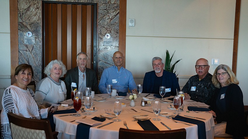Jayne Meth, Barbara Chase, Jeff Sebeika, Charlie Huisking, Tom Edwards, Michael Sydow and Ginny Contestable sat together at the Feb. 10 Longboat Key Democratic Club Luncheon.
