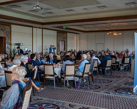 Longboat Key Democratic Club President Lucie Lapovsky (right) updates the 160 attendees on new initiatives the Club is starting soon at a luncheon Tuesday, Feb. 10.