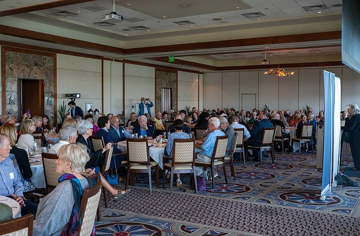 Longboat Key Democratic Club President Lucie Lapovsky (right) updates the 160 attendees on new initiatives the Club is starting soon at a luncheon Tuesday, Feb. 10.