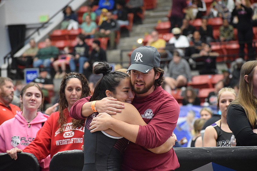 Payton Mangay-Ayam (left) and coach Jordan Borges (right) have worked together for four seasons. Their high-school partnership ended with an unprecedented team state title.