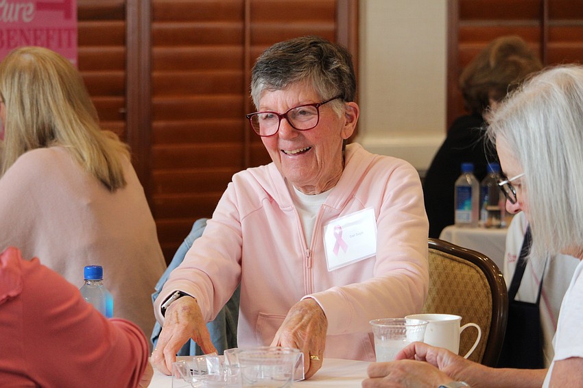 Gail Sugar starts a new round at the Go for the Cure games day for Breast Health Sarasota Inc.