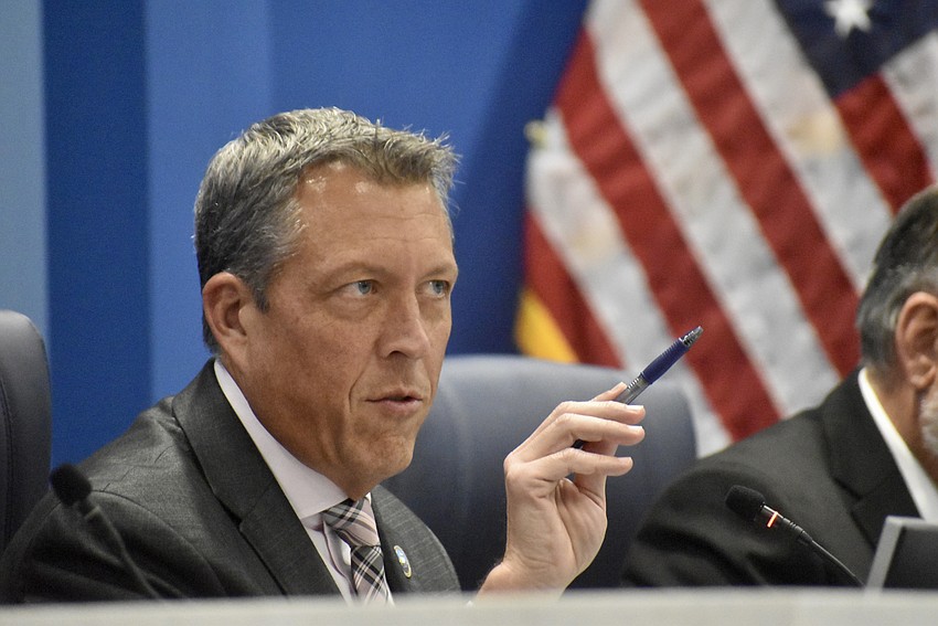 Commissioner George Kruse defends the project for being sensible. He was on the board when the first application for over 200 homes on the same site was denied.