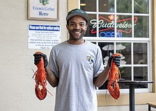 General manager Desmond Hill brings warmth and ease to Lucky Pelican’s welcoming, neighborhood vibe.