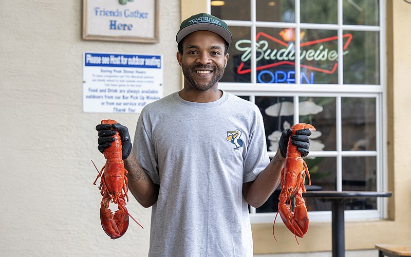 General manager Desmond Hill brings warmth and ease to Lucky Pelican’s welcoming, neighborhood vibe.