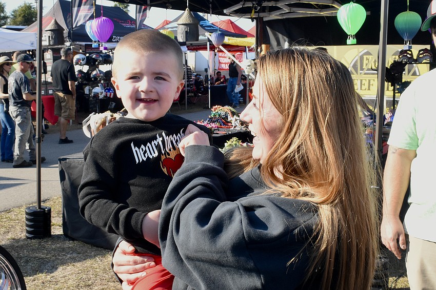 Ro Delane, 3, and his mother Abbie Delane, enjoy time together at the event.