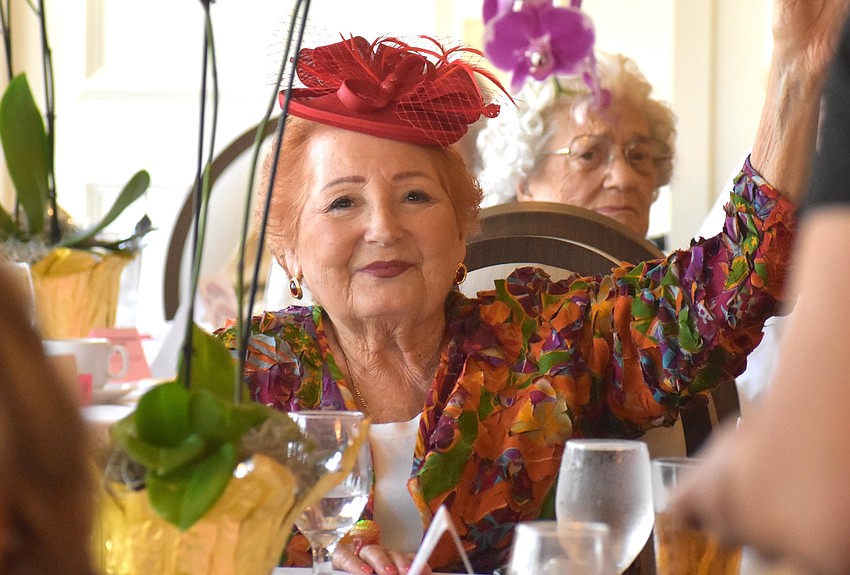 Carolann Garafola, charities chair for the Palm Aire Women's Club, says she gets stopped regularly when wearing clothes from Darci's boutique. She says she loves the variety of fashion from the 